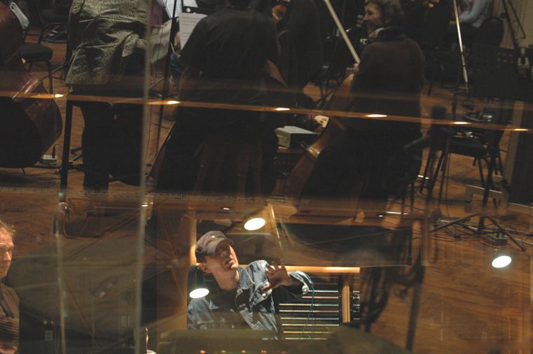 Scott Walker, seen in reflection in the recording studio