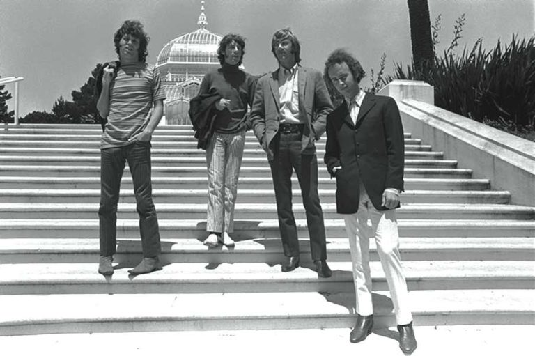 The Doors pose on some steps