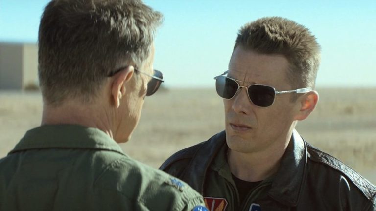 Commanding officer Bruce Greenwood talks to drone pilot Ethan Hawke in Good Kill