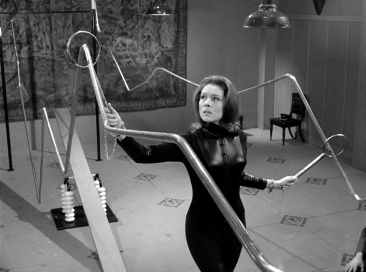 Emma Peel plays a deadly beat the buzzer game