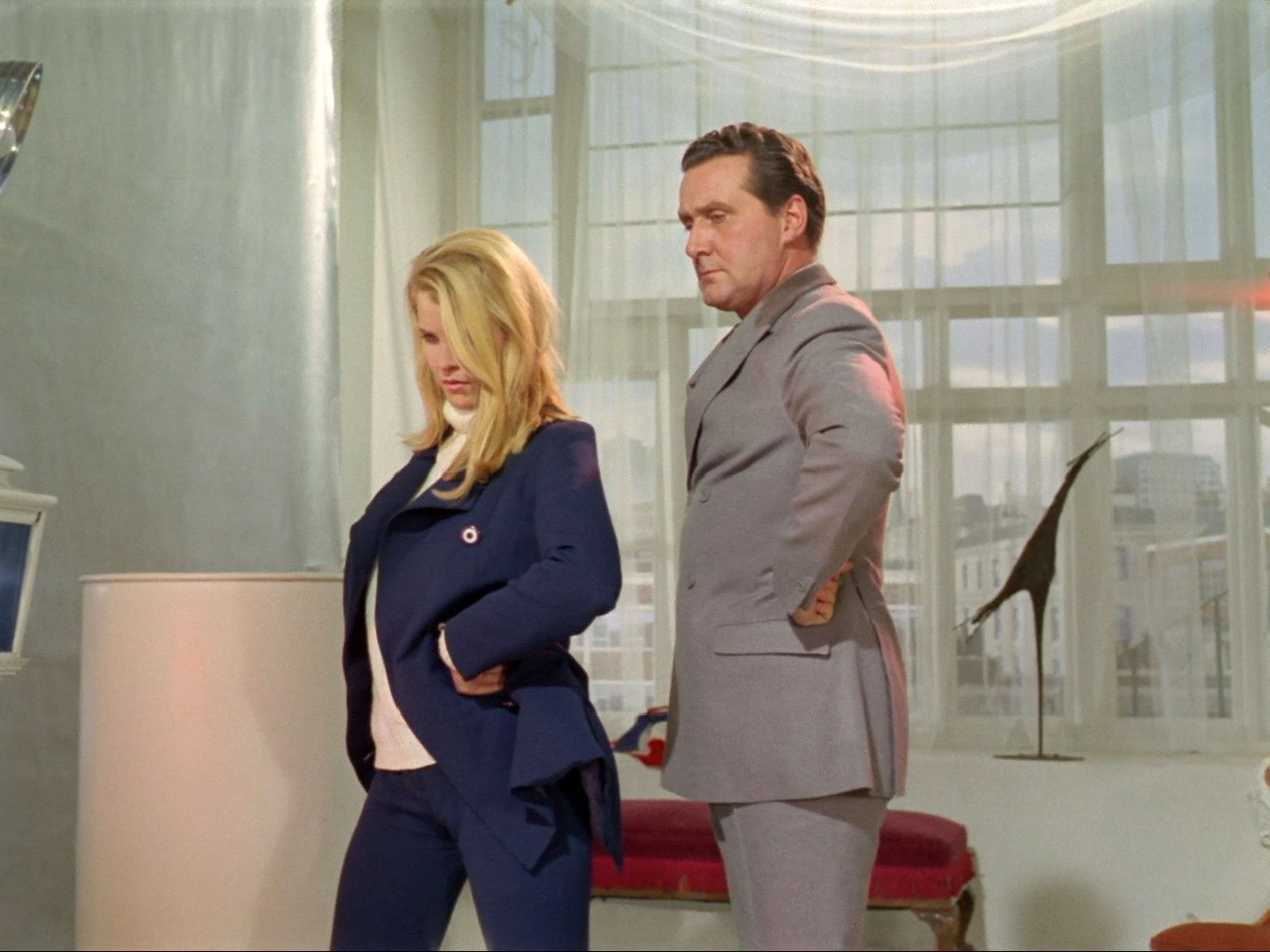 John Steed does some modelling with a blonde woman