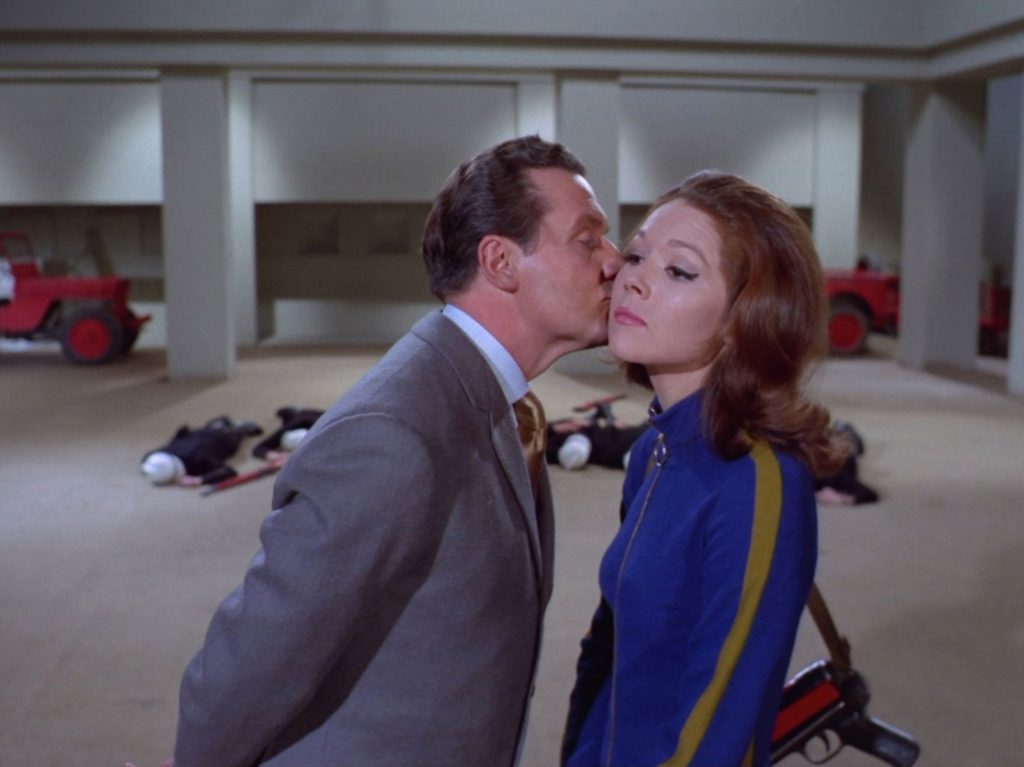 John Steed pecks Mrs Peel on the cheek
