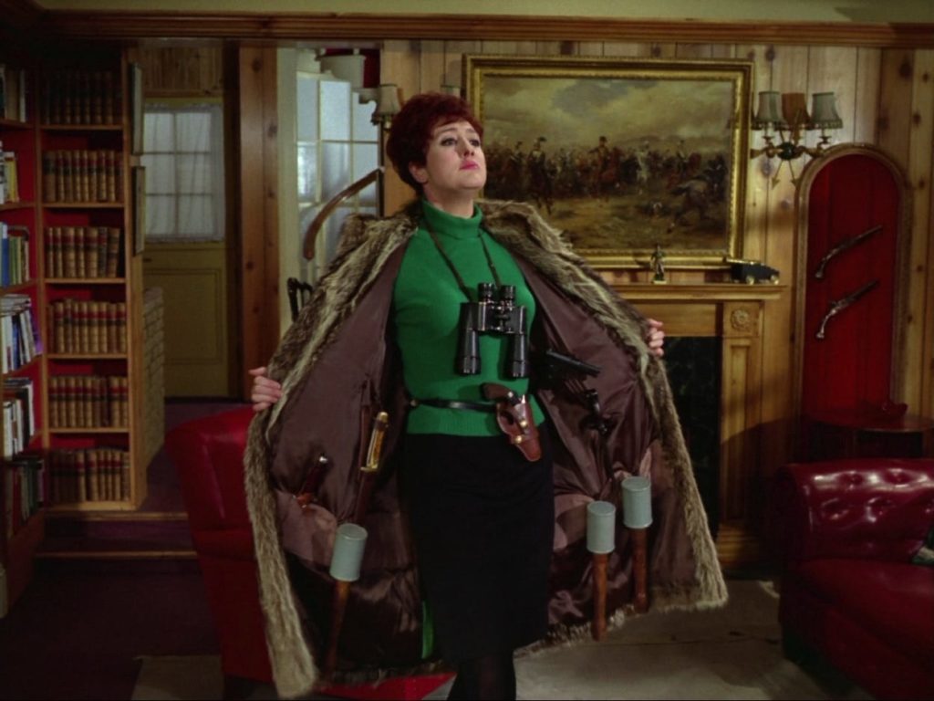 Olga reveals an arsenal under her coat