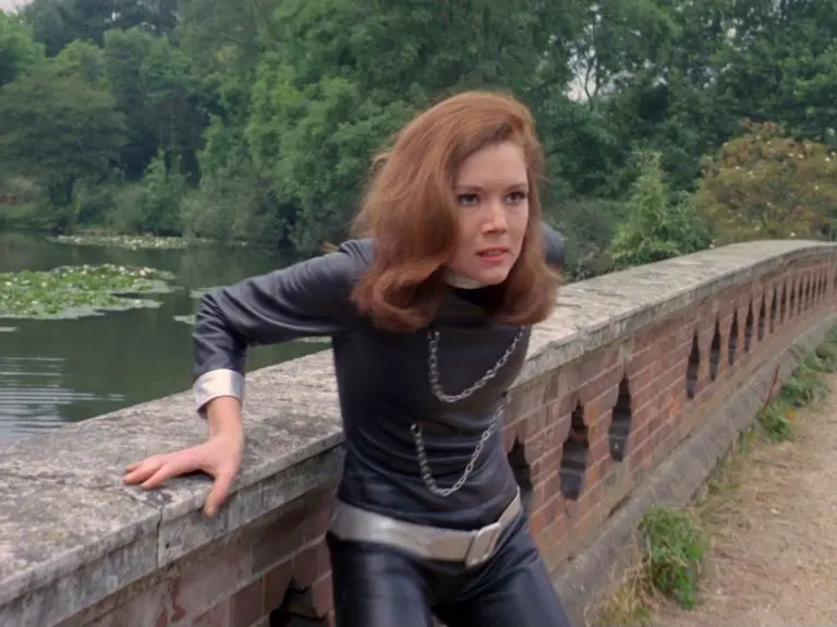 Diana Rig on a bridge