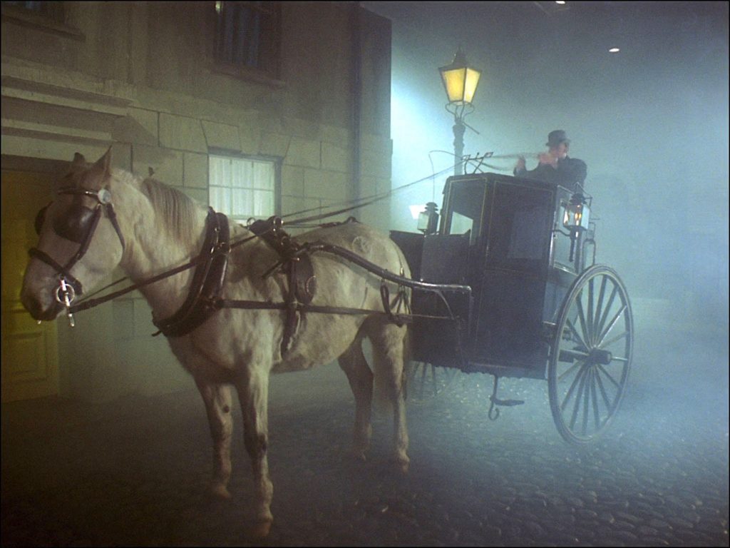 A hansom cab in the fog
