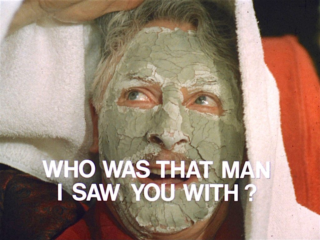Alan MacNaughtan in a green face mask