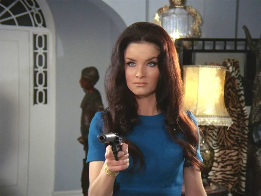 Kate O'Mara with a gun