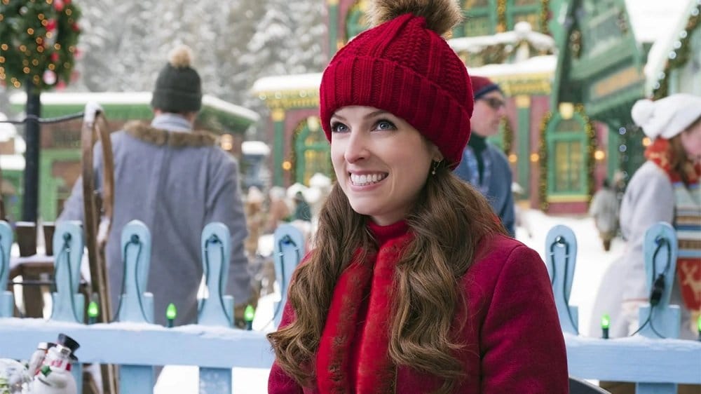 Anna Kendrick in bobble hat and warm coat