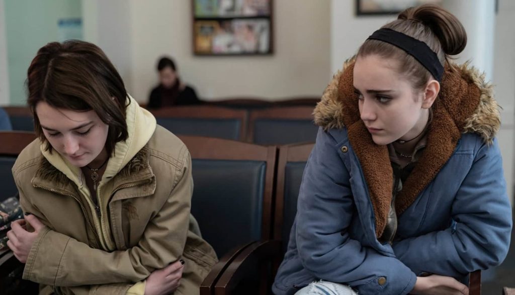 Autumn and Skylar in a clinic waiting room