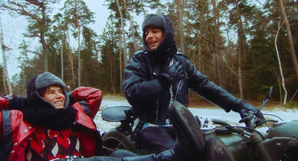 Qodrat and Hasib on a motorbike