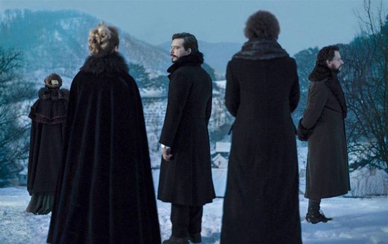The cast of Malmkrog outside in the snow