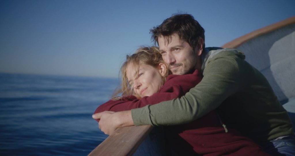 Adrienne and Matteo happy on a boat