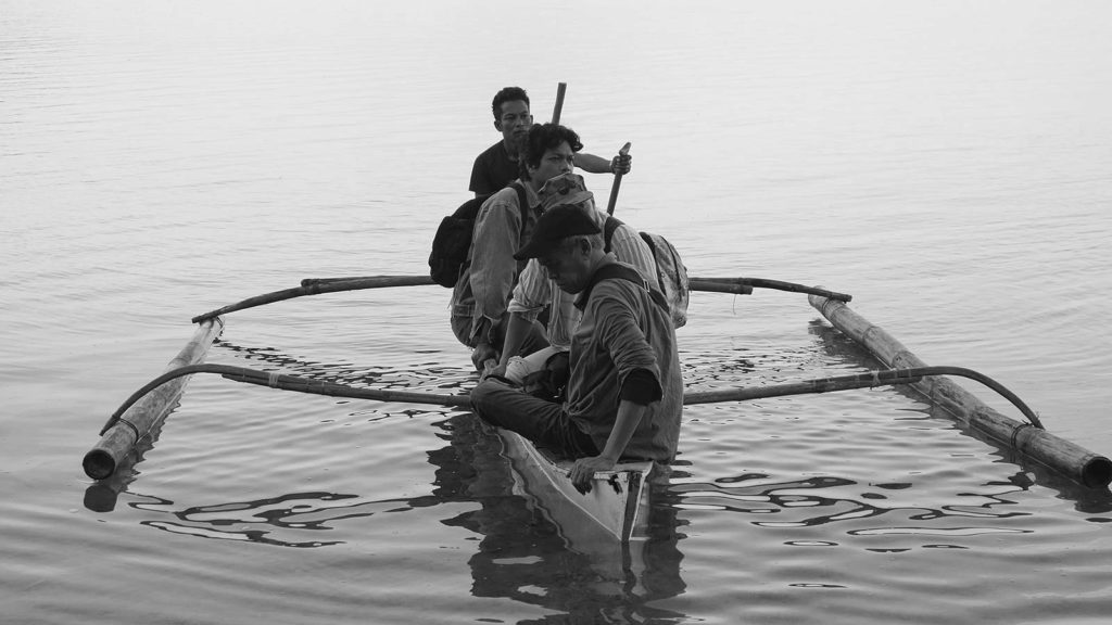 The men in a canoe