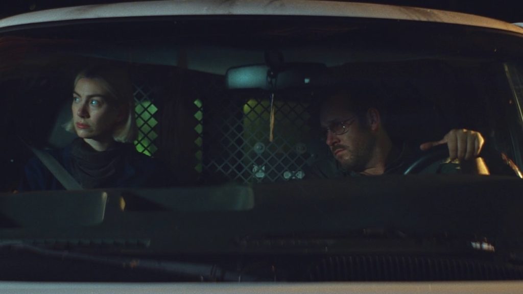 Anna and Ray in a car
