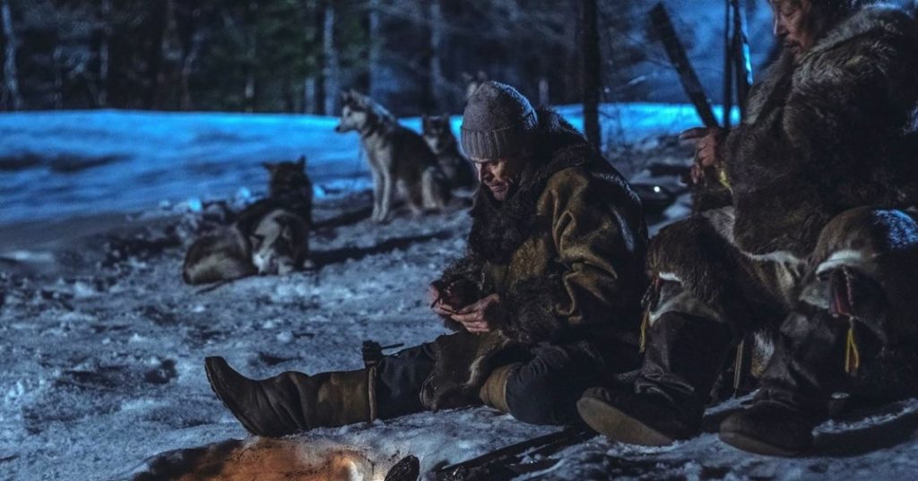 Clint and an Inuit man out in the snow