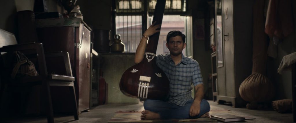 Sharad with a sitar