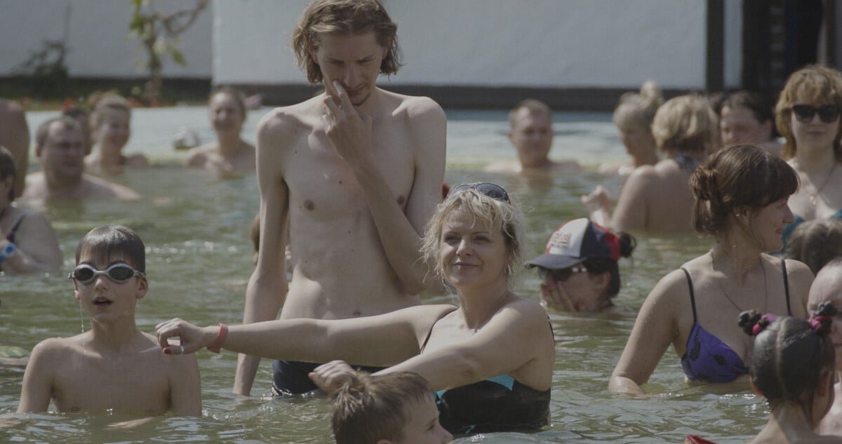 Vadim and his mother in a pool