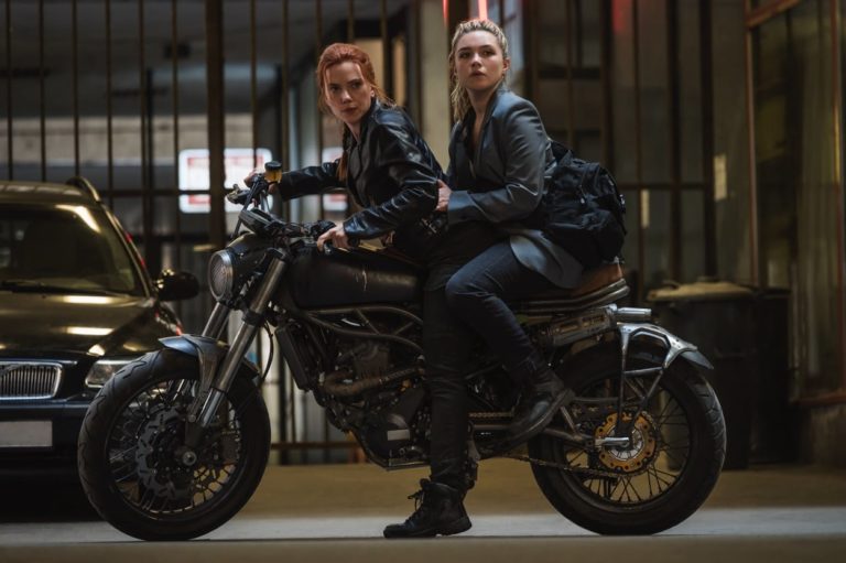 Black Widow and Yelena on a bike