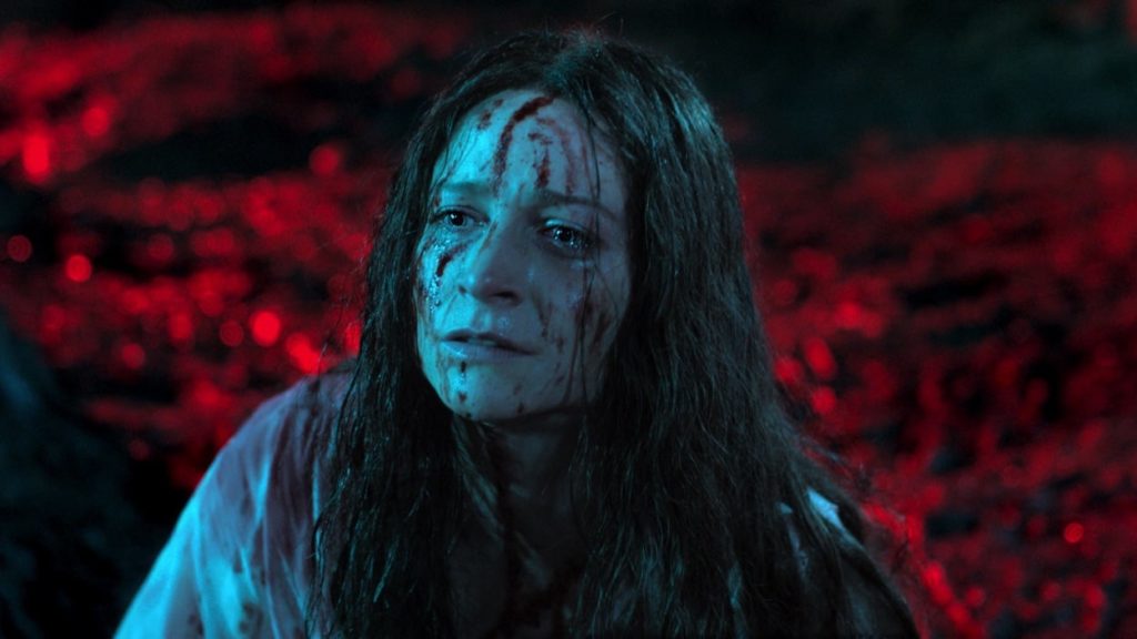 Enid covered in blood