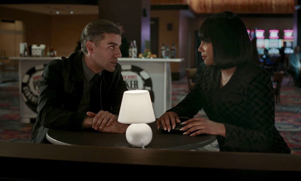 Oscar Isaac and Tiffany Haddish at a table