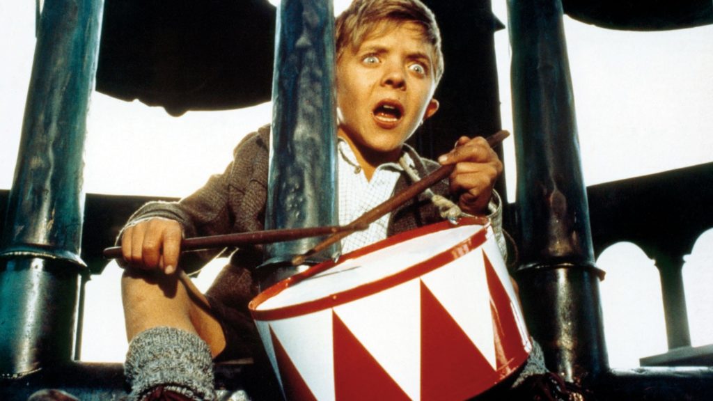 Oskar bangs his drum