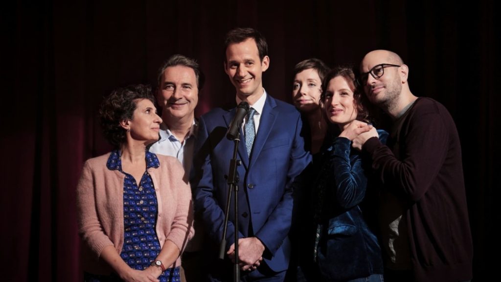 Cast photo with Benjamin Lavernhe centre