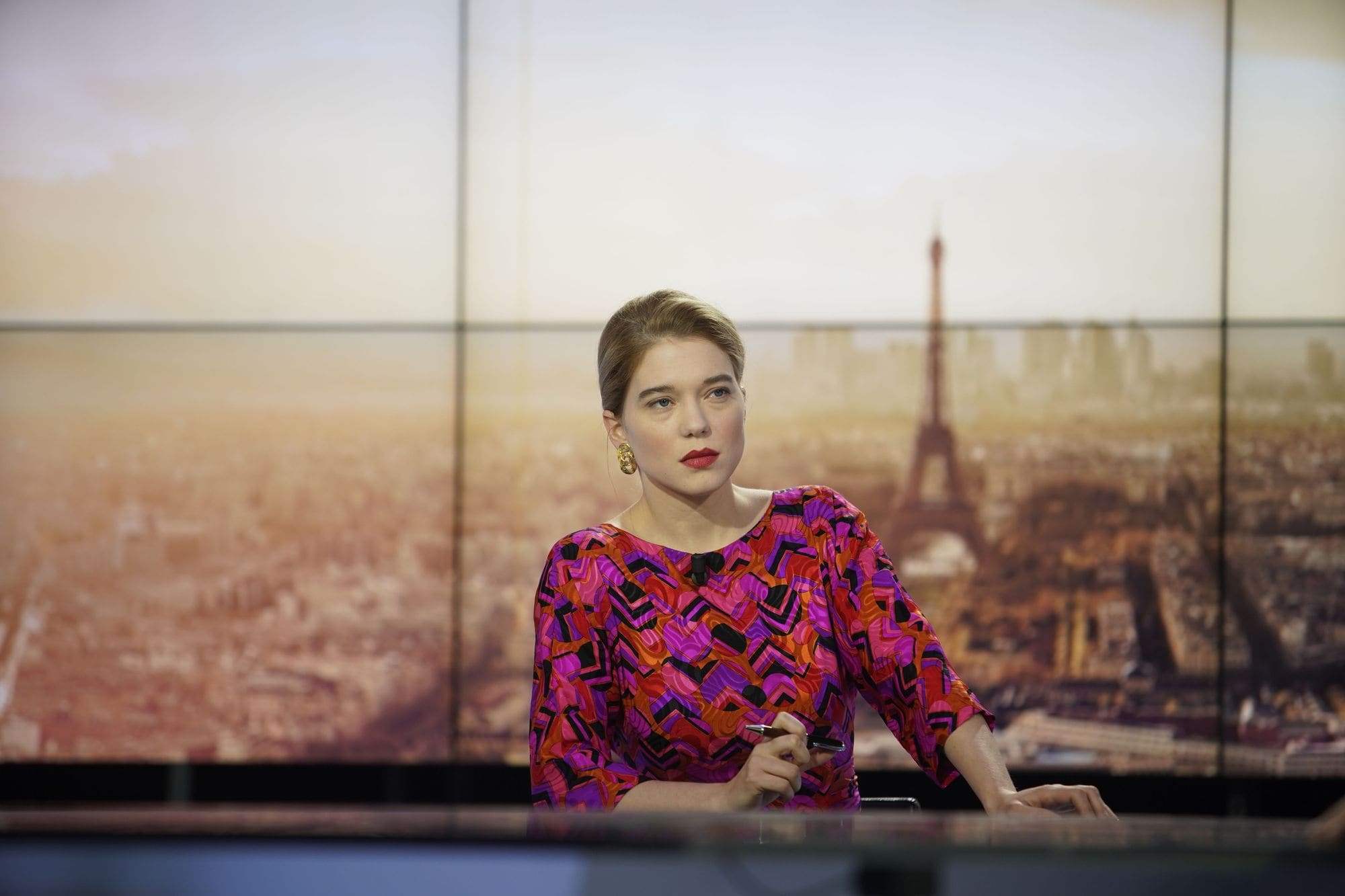 France de Meurs behind the news desk