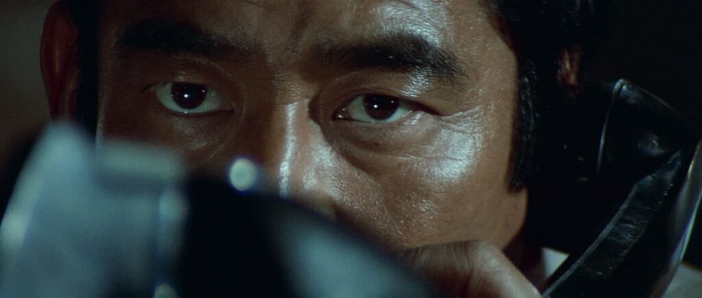 Ken Takakura as the mastermind behind the bomb