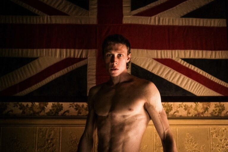 A topless George MacKay as Ned Kelly