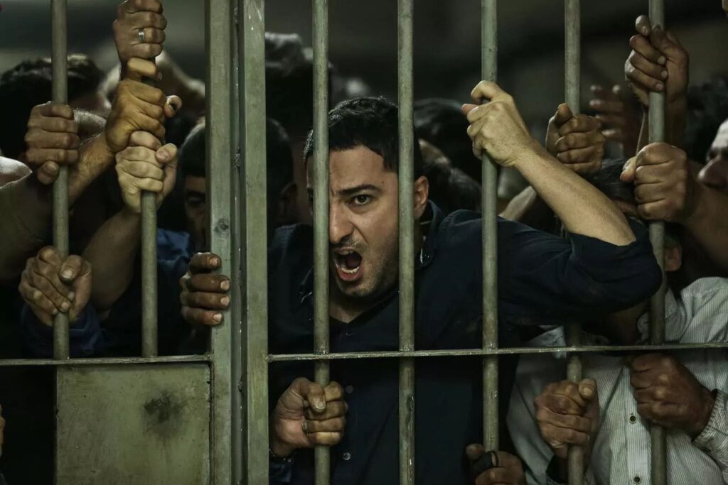 Khakzad behind a locked prison gate