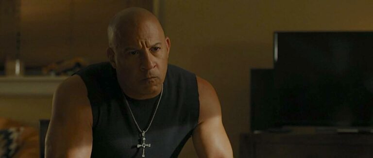 Vin Diesel in black cap-sleeve T shirt