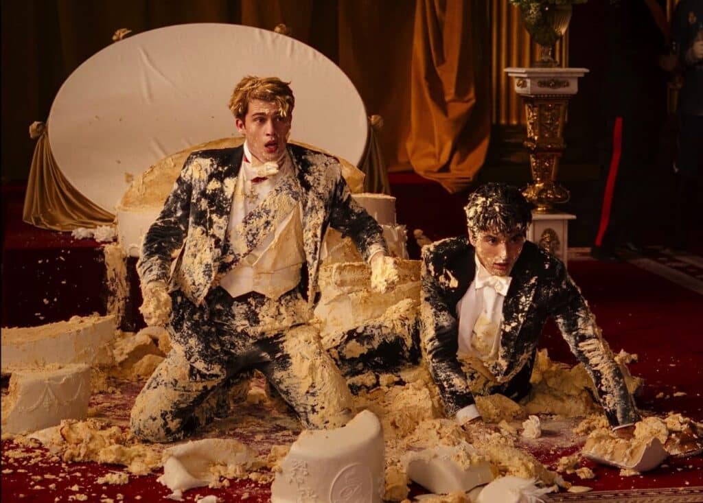 Henry and Alex covered in cake
