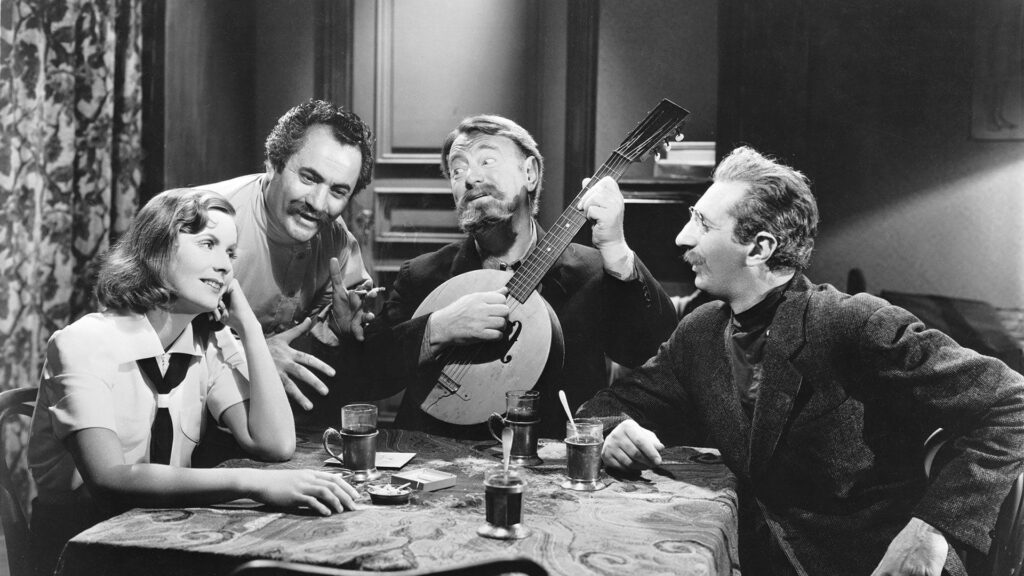 Ninotchka with fellow Russians Kopalski, Iranoff and Buljanoff