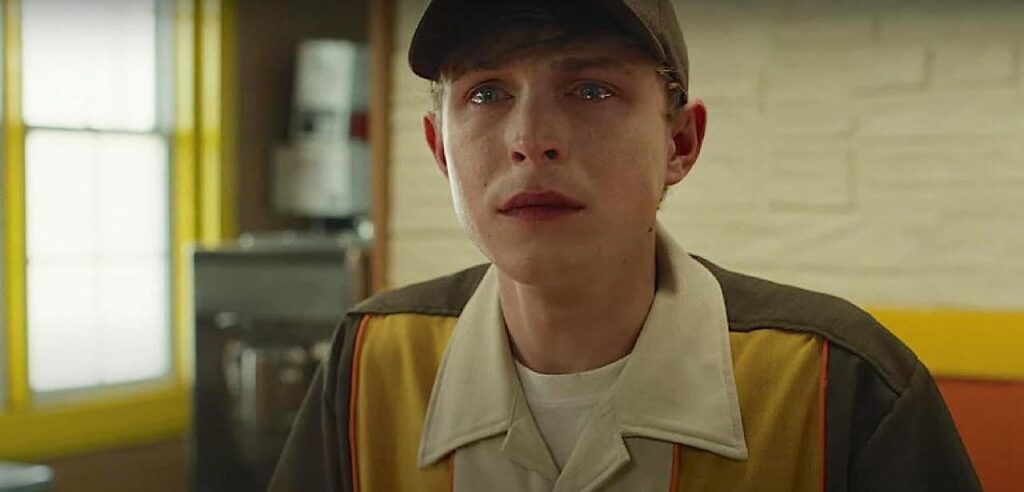 Randy in his fast food uniform