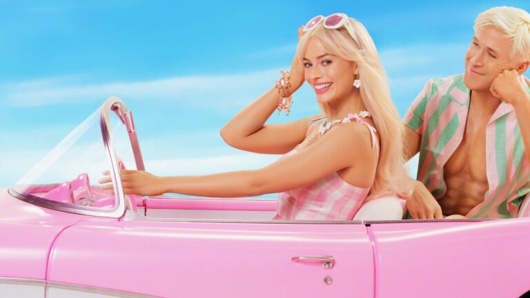 Barbie and Ken in her car
