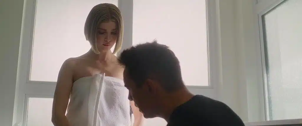 Meredith in a towel while Bradwell checks her over