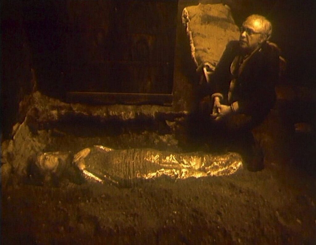 Professor Larsen buries his dead wife