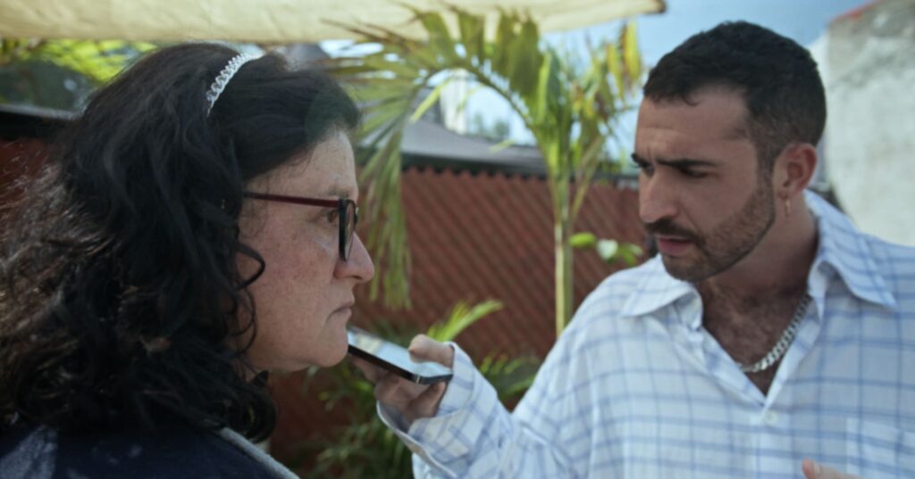 Señora Vero is questioned by a suspicious Jordan