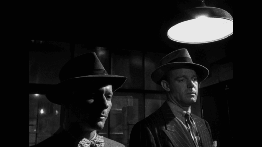 Alfred Ryder and Dennis O'Keefe in character as gang members