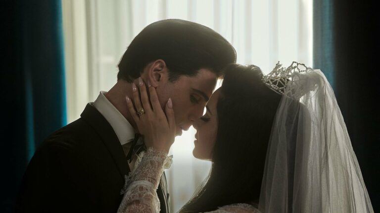 Elvis and Priscilla kiss on their wedding day