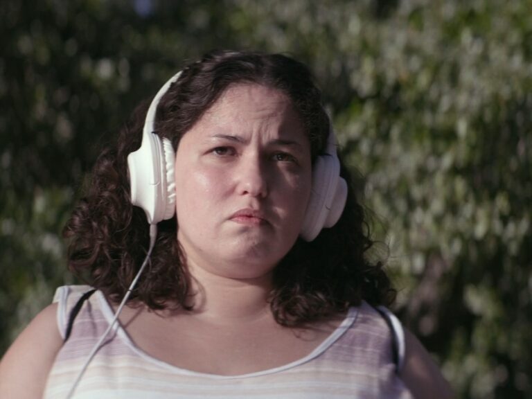 Sara wearing headphones