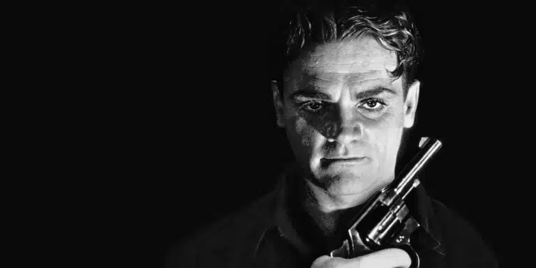 Close up of Cagney as a gun-wielding Cody Jarrett