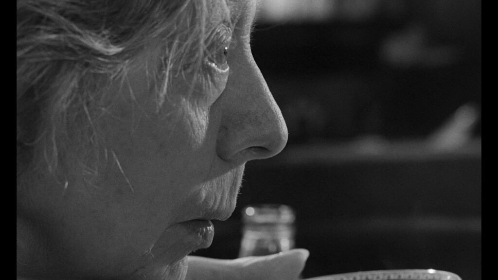 Close up of Edith Evans as Mrs Ross