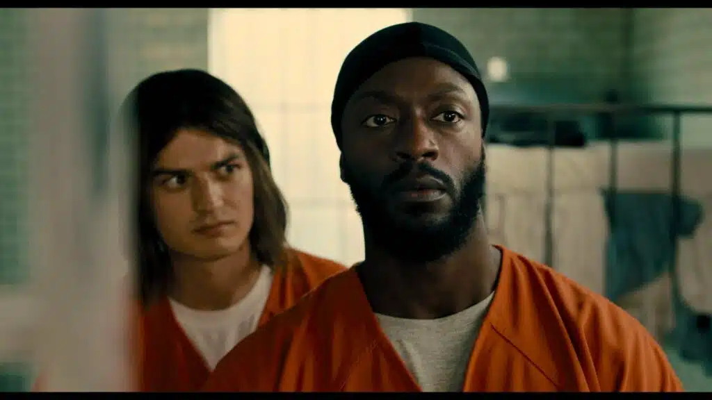 Baron and Otis in prison clothes