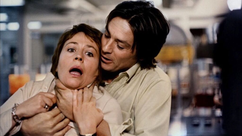 Hélène is strangled by Dr Devilers