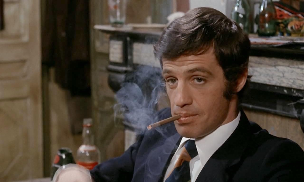François Holin smoking a cigar
