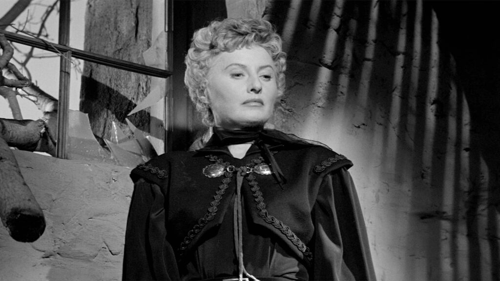 Barbara Stanwyck dressed in black