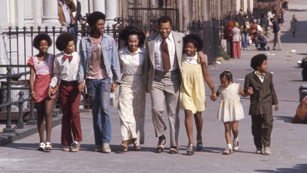 Claudine, Roop and her family together on the street