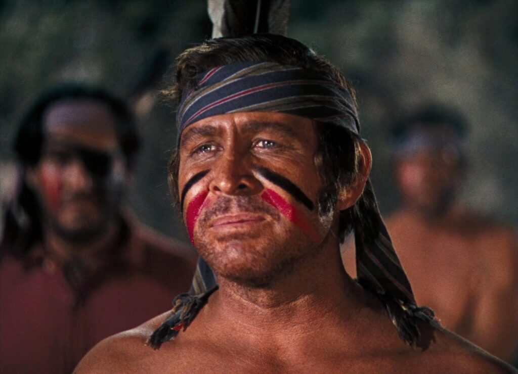 Jack Slade (Barton MacLane) as a phoney Indian