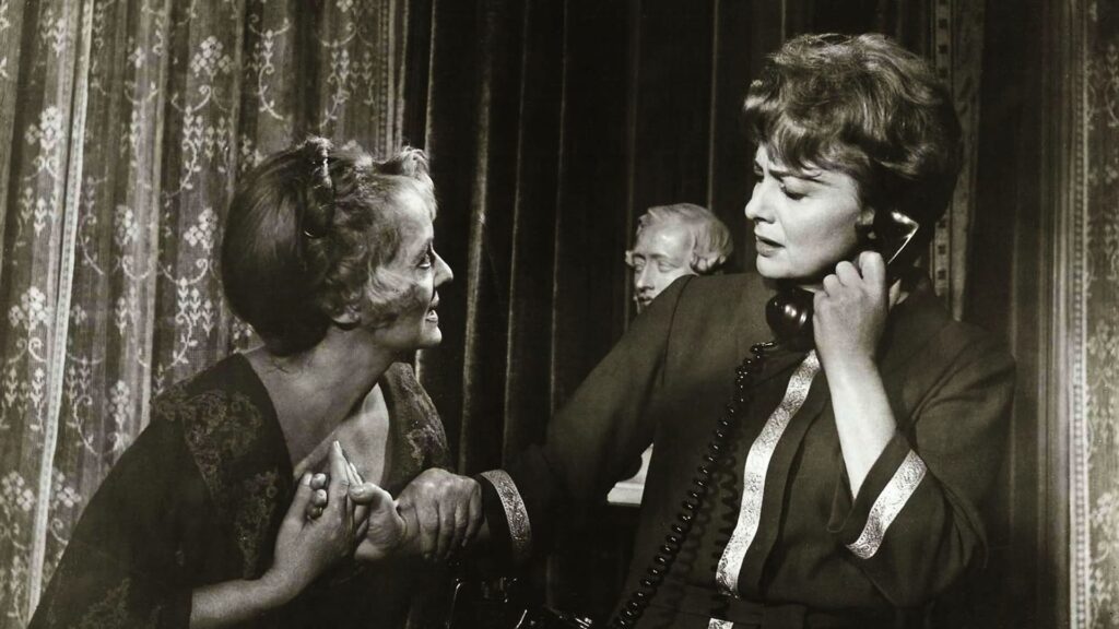 An imploring Charlotte with Miriam